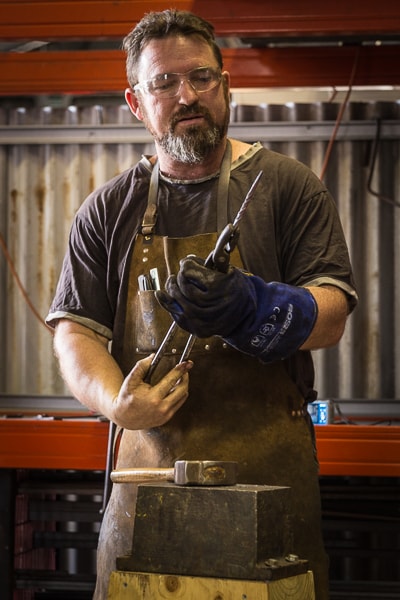 Adam Fromholtz blacksmithing at Tharwa Valley Forge
